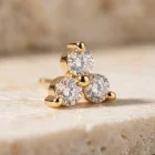 Trinity 18K gold threadless top with three white moissanites, close-up
